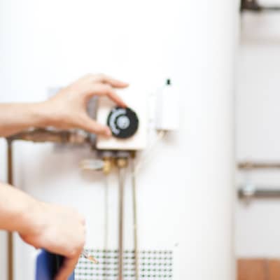 Inspecting Water Heater